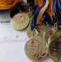 Іменні медалі для випускників Гілочка