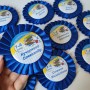 Значки першокласників з синьою розеткою